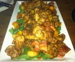 Spicy Chicken Thighs with Pumpkin and Speck, served with Tomato Potatoes