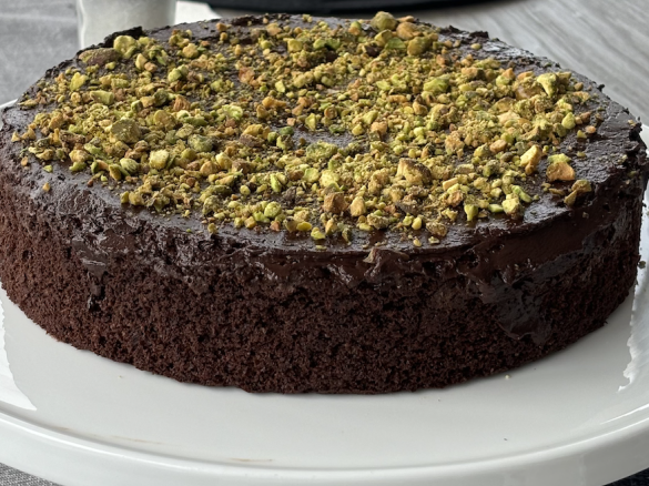 Weng's chocolate beetroot pistachio cake with a shiny chocolate ganache